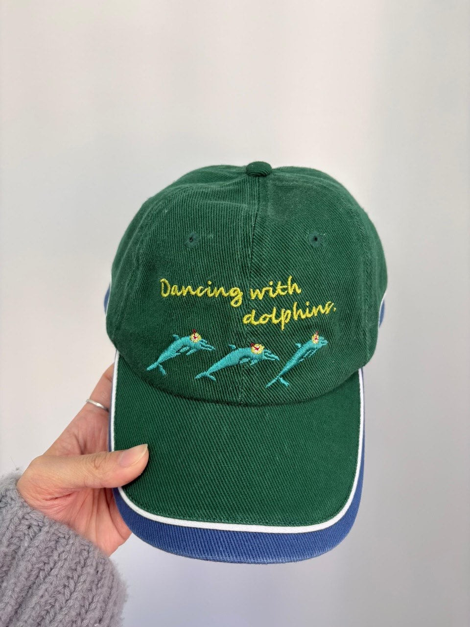 DANCING WITH DOLPHINS CAP PREORDER