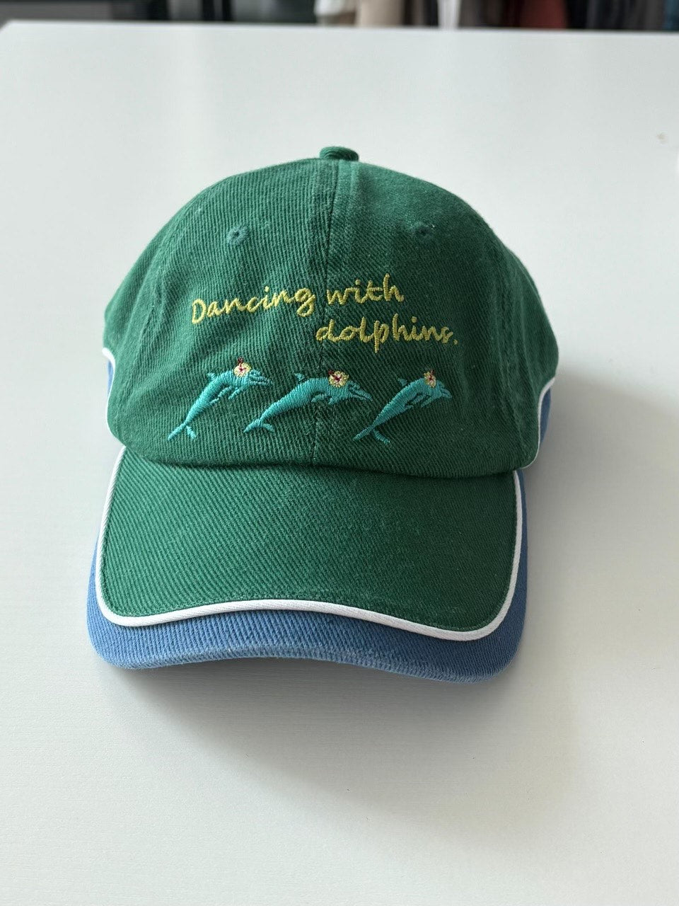 DANCING WITH DOLPHINS CAP PREORDER